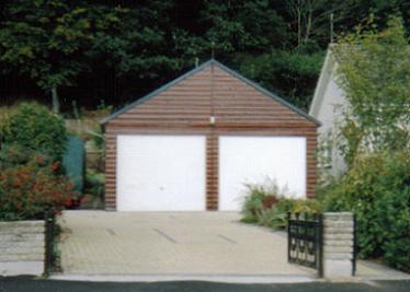 Double Garage with metal up-and-over doors.