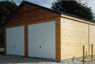 Double Garage with up-and-over metal doors and Permadri Profile Sheeting roof.